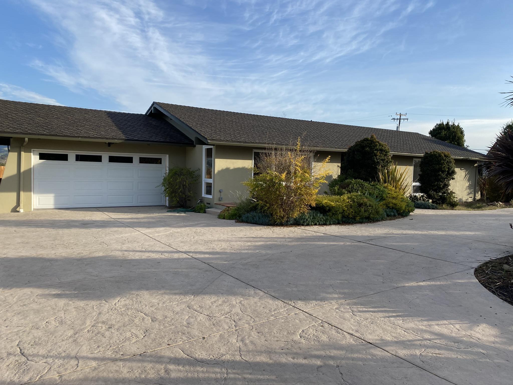 front view of a house with a street