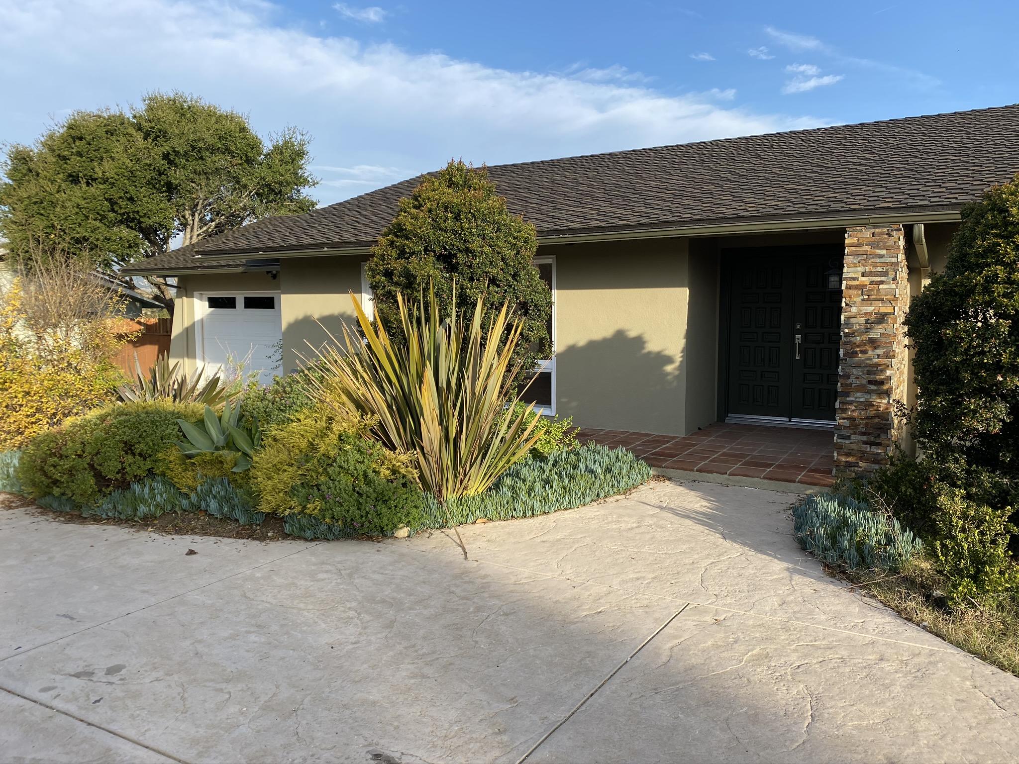 5160 Via Valverde Santa Barbara, CA 93111 - Photo 2 of 12 a front view of a house with a garden