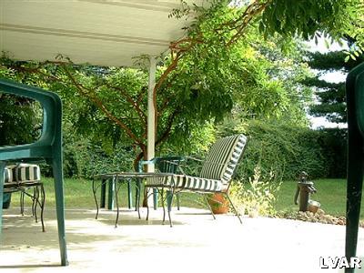 1230 Stark Road Bethlehem, PA 18017 - Photo 15 of 15 Warm and private South Patio, sheltered under roof, overlooks the back yard.