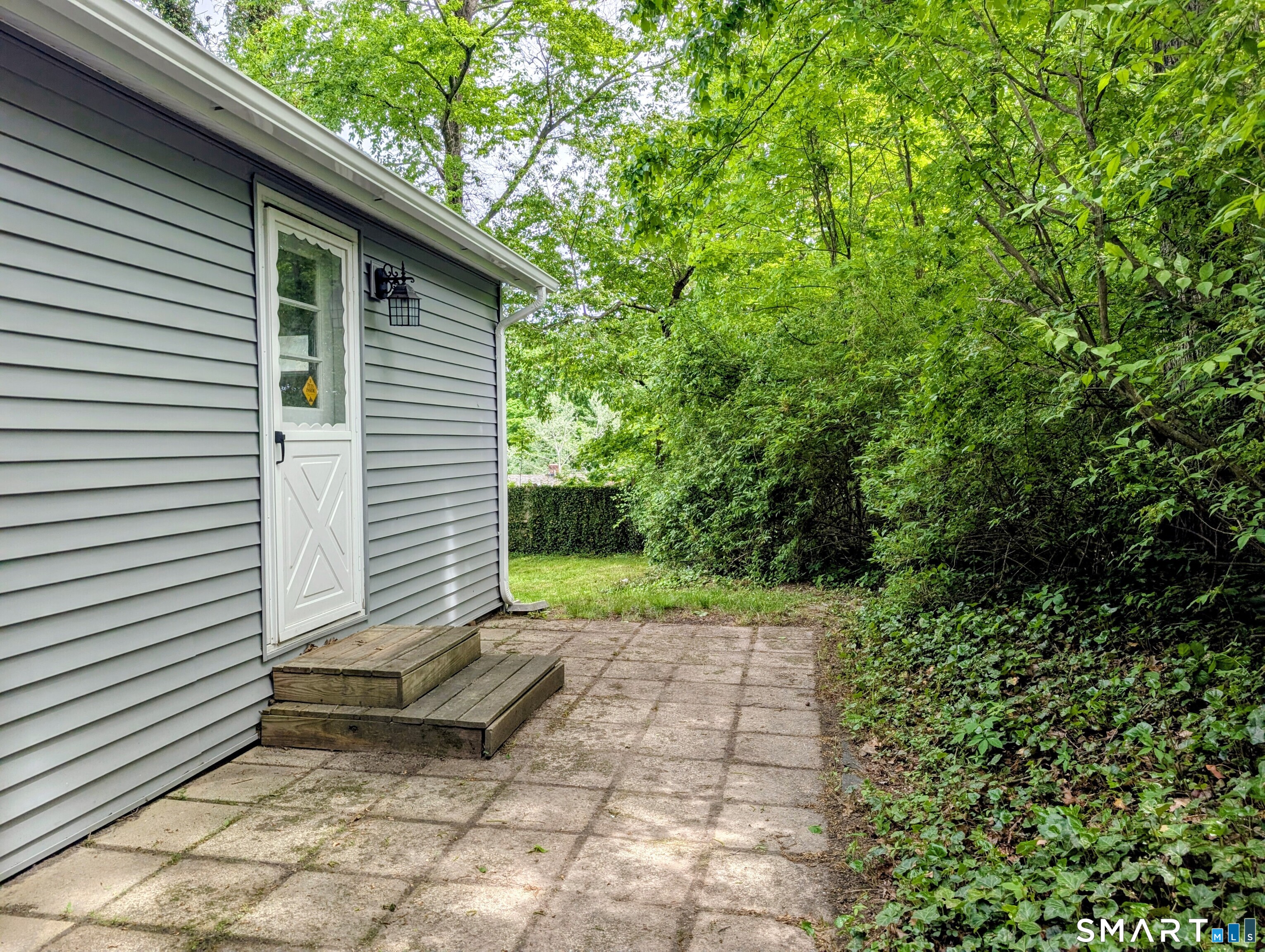 173 Daly Road Coventry, CT 06238 - Photo 20 of 27 Patio is off of Primary Bedroom.