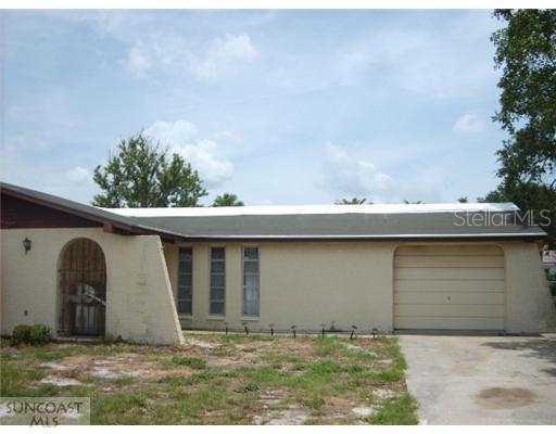 9436 Maxwell Lane Port Richey, FL 34668 - Photo 1 of 1 Exterior Front
