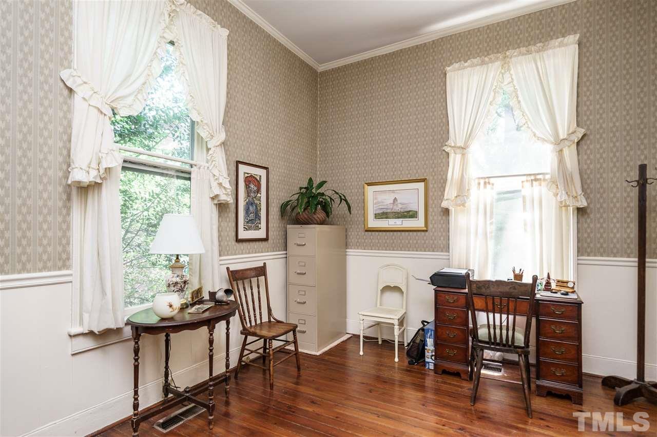 325 Polk Street Raleigh, NC 27604 - Photo 14 of 25 a view of a dining room with furniture window and wooden floor