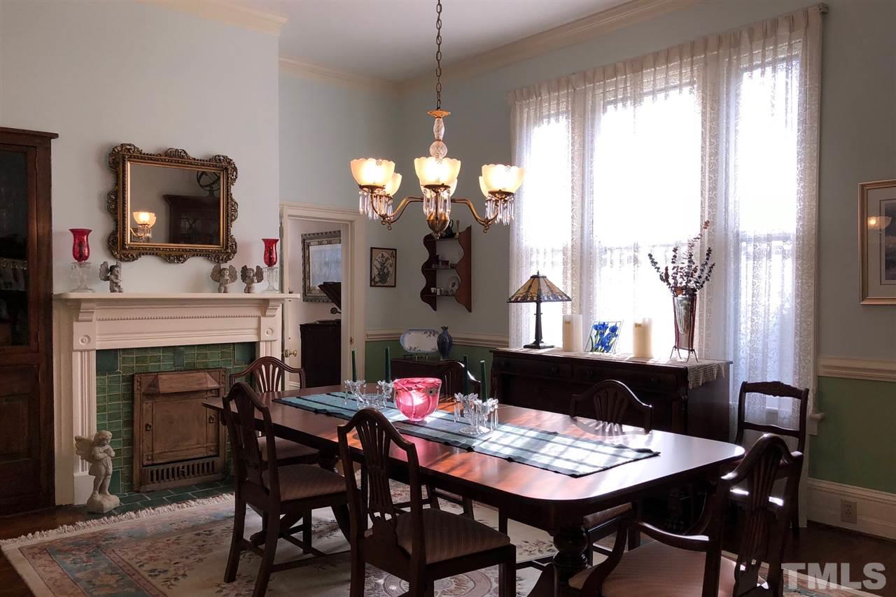 325 Polk Street Raleigh, NC 27604 - Photo 10 of 25 a view of a dining room with furniture window and outside view