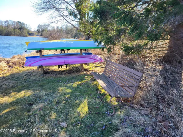 a view of a yard with an outdoor space