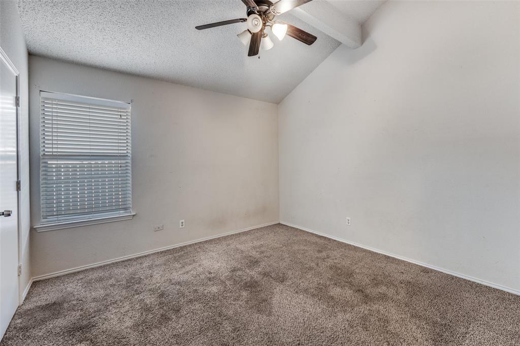 803 Canary Lane Mansfield, TX 76063 - Photo 15 of 25 an empty room with windows and fan