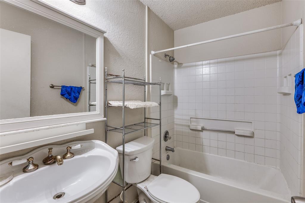 803 Canary Lane Mansfield, TX 76063 - Photo 18 of 25 a bathroom with a sink toilet and shower