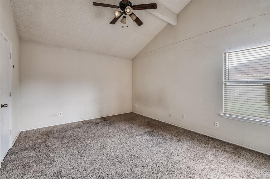 803 Canary Lane Mansfield, TX 76063 - Photo 21 of 25 a view of a room with a exposed radiator and closet