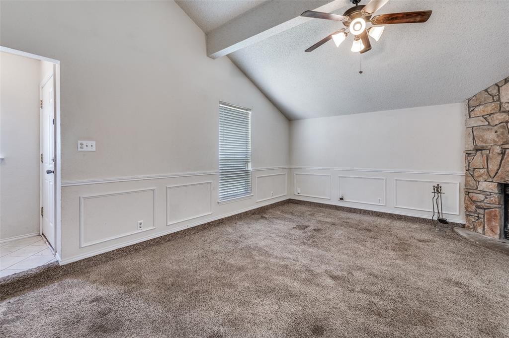 803 Canary Lane Mansfield, TX 76063 - Photo 5 of 25 an empty room with chandelier fan