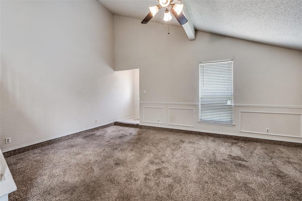 803 Canary Lane Mansfield, TX 76063 - Photo 8 of 25 an empty room with a chandelier fan