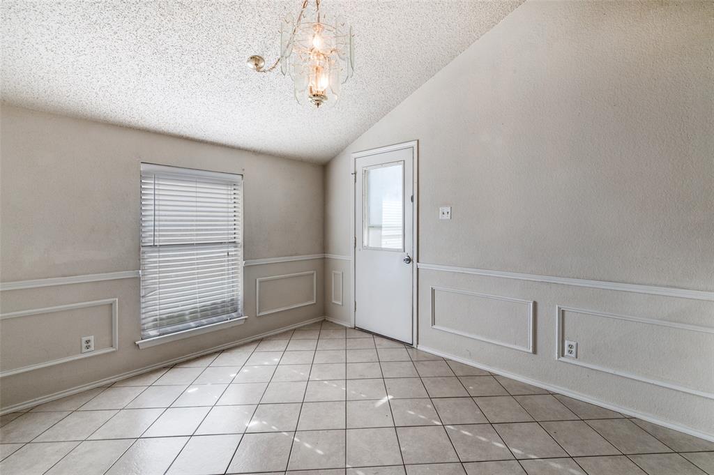 803 Canary Lane Mansfield, TX 76063 - Photo 9 of 25 a view of an empty room with a window
