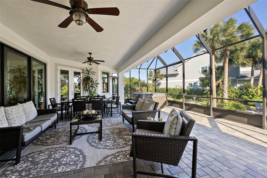 100 Seaside Pt Point Flagler Beach, FL 32136 - Photo 16 of 70 a living room with furniture and a floor to ceiling window