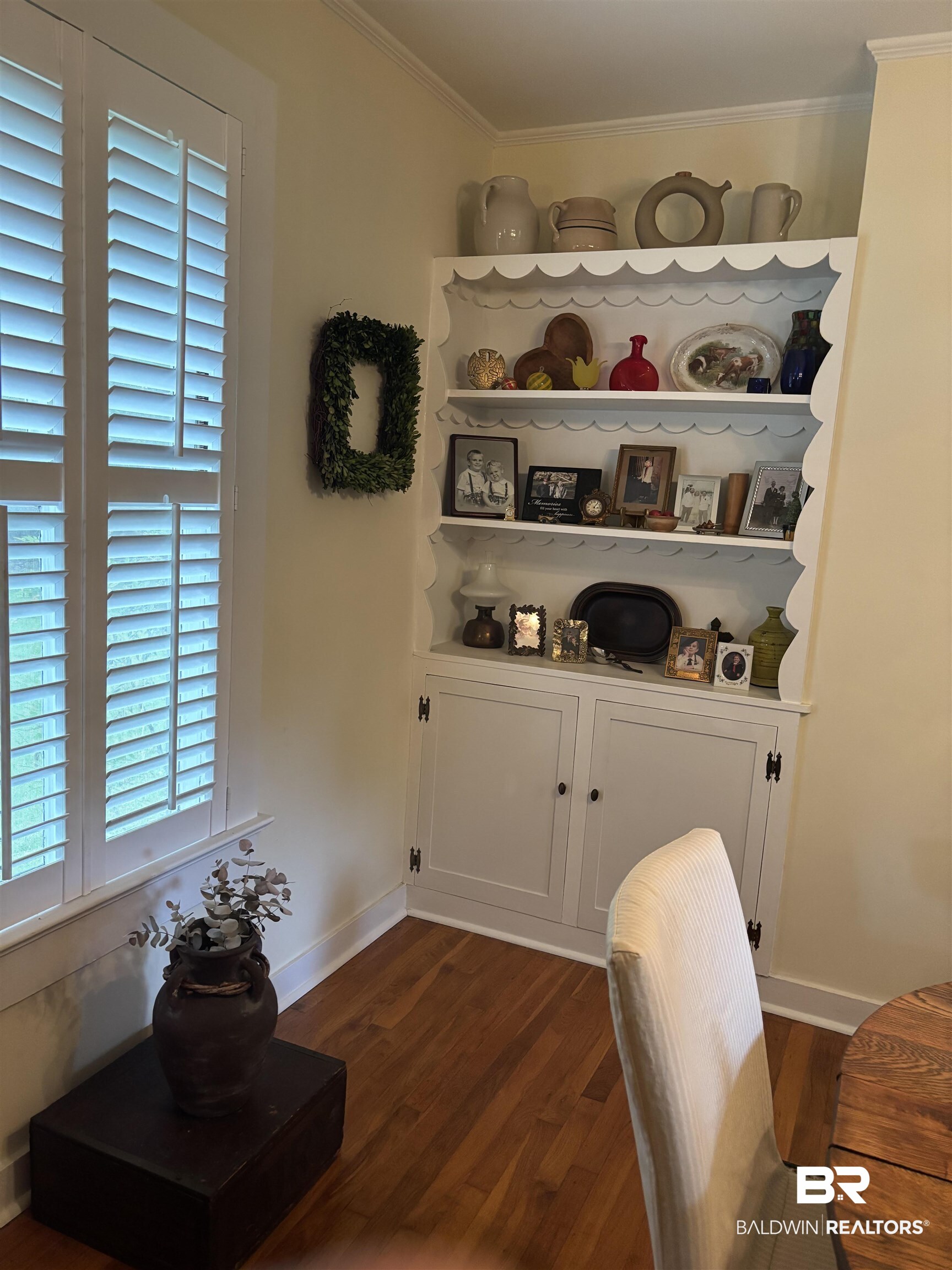 216 West Orange Avenue Foley, AL 36535 - Photo 19 of 37 Office space with dark wood finished floors, baseboards, and ornamental molding