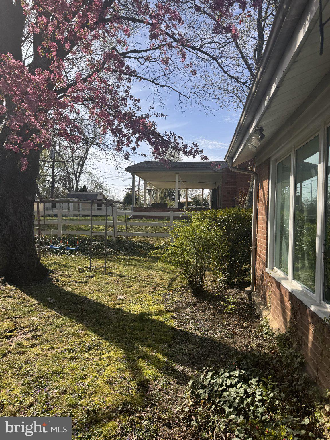 1456 Thornberry Road Wyncote, PA 19095 - Photo 3 of 8 Charming garden with blooming trees.