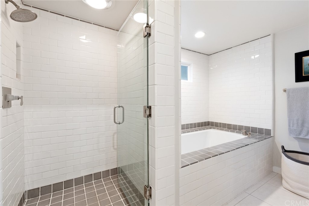 504 Avenida Largo Newport Beach, CA 92660 - Photo 11 of 36 a bathroom with a granite countertop sink a toilet and shower
