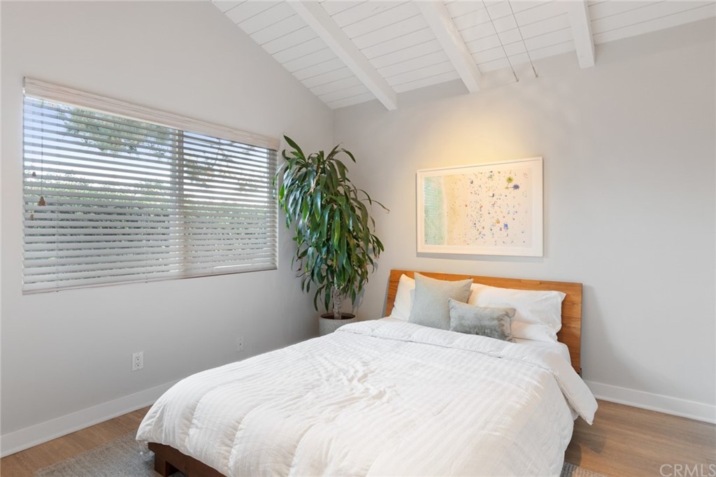 504 Avenida Largo Newport Beach, CA 92660 - Photo 12 of 36 a bedroom with a bed and a window