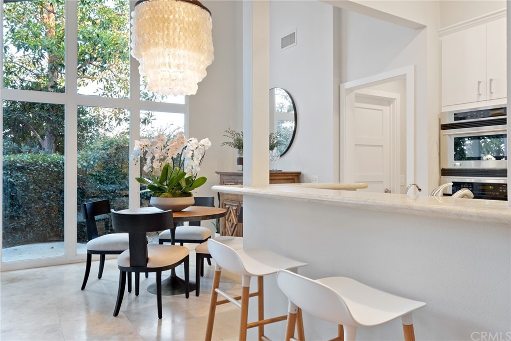 504 Avenida Largo Newport Beach, CA 92660 - Photo 2 of 36 a view of a dining room with furniture window and outside view