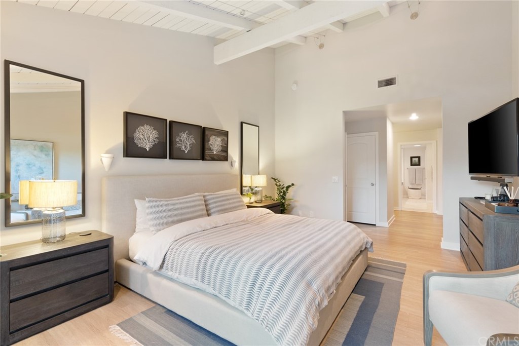 504 Avenida Largo Newport Beach, CA 92660 - Photo 7 of 36 a bedroom with a bed and a flat screen tv