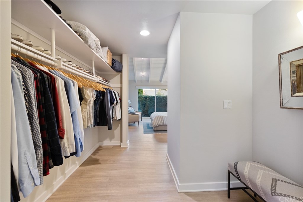 504 Avenida Largo Newport Beach, CA 92660 - Photo 8 of 36 a hallway with a couch and a window