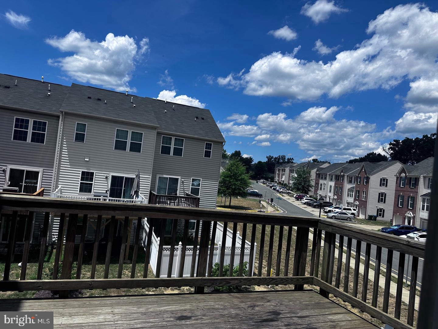 313 Brenton Road, Unit 40 Fredericksburg, VA 22405 - Photo 18 of 18 Sunny skies over charming townhomes.