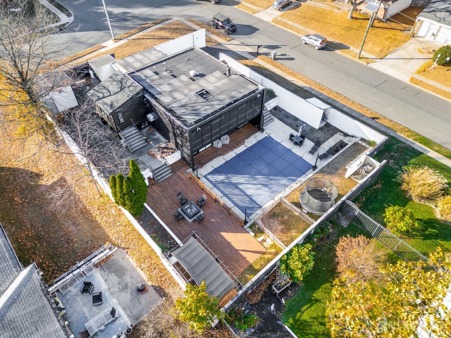 123 Risoli Terrace South Plainfield, NJ 07080 - Photo 19 of 46 an aerial view of residential houses with outdoor space