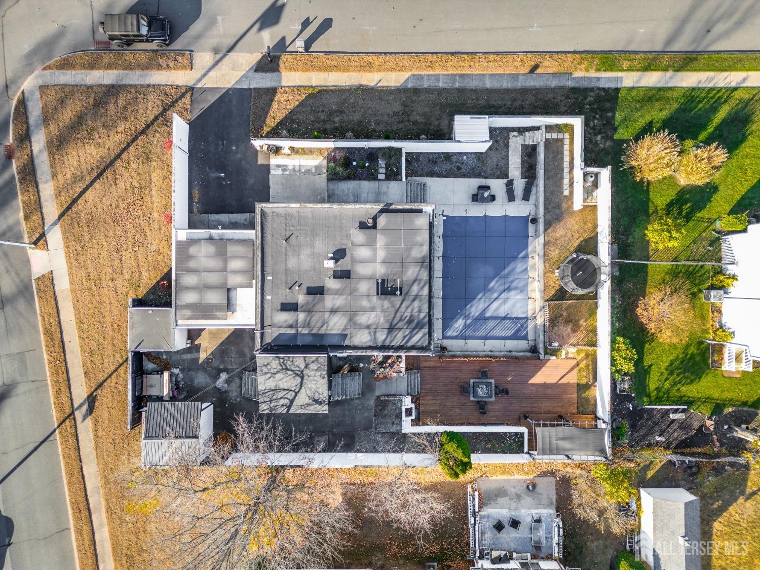 123 Risoli Terrace South Plainfield, NJ 07080 - Photo 20 of 46 an aerial view of a house with swimming pool