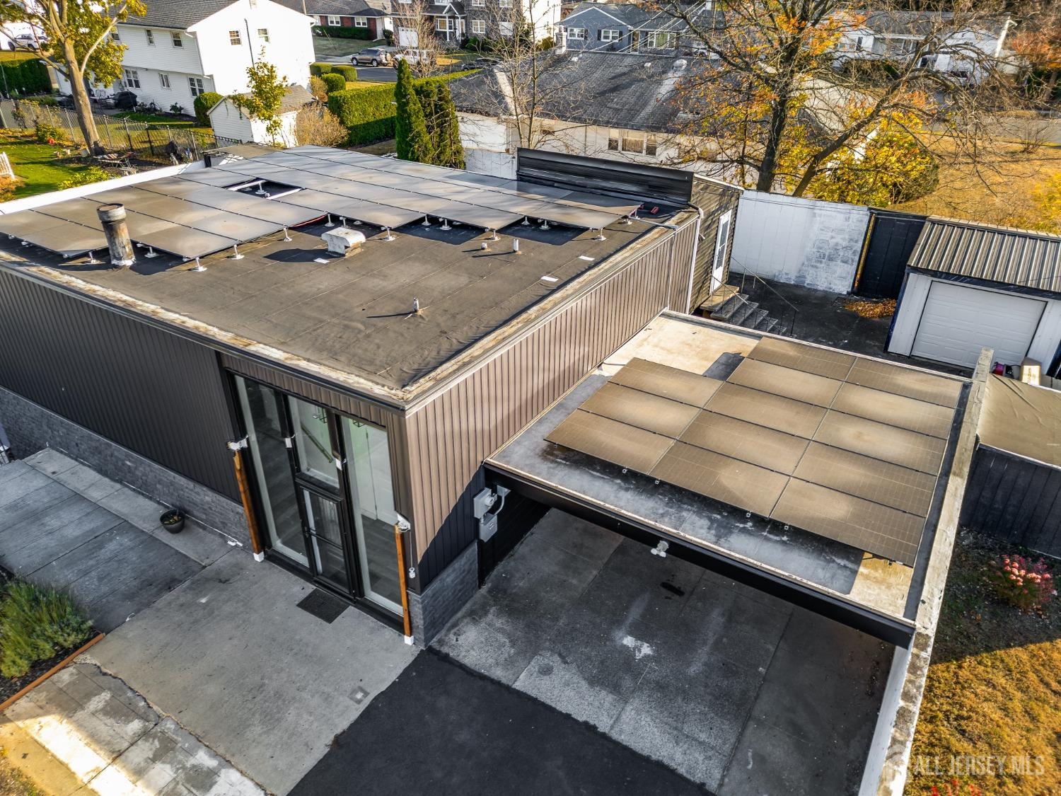 123 Risoli Terrace South Plainfield, NJ 07080 - Photo 22 of 46 a view of a patio with chairs
