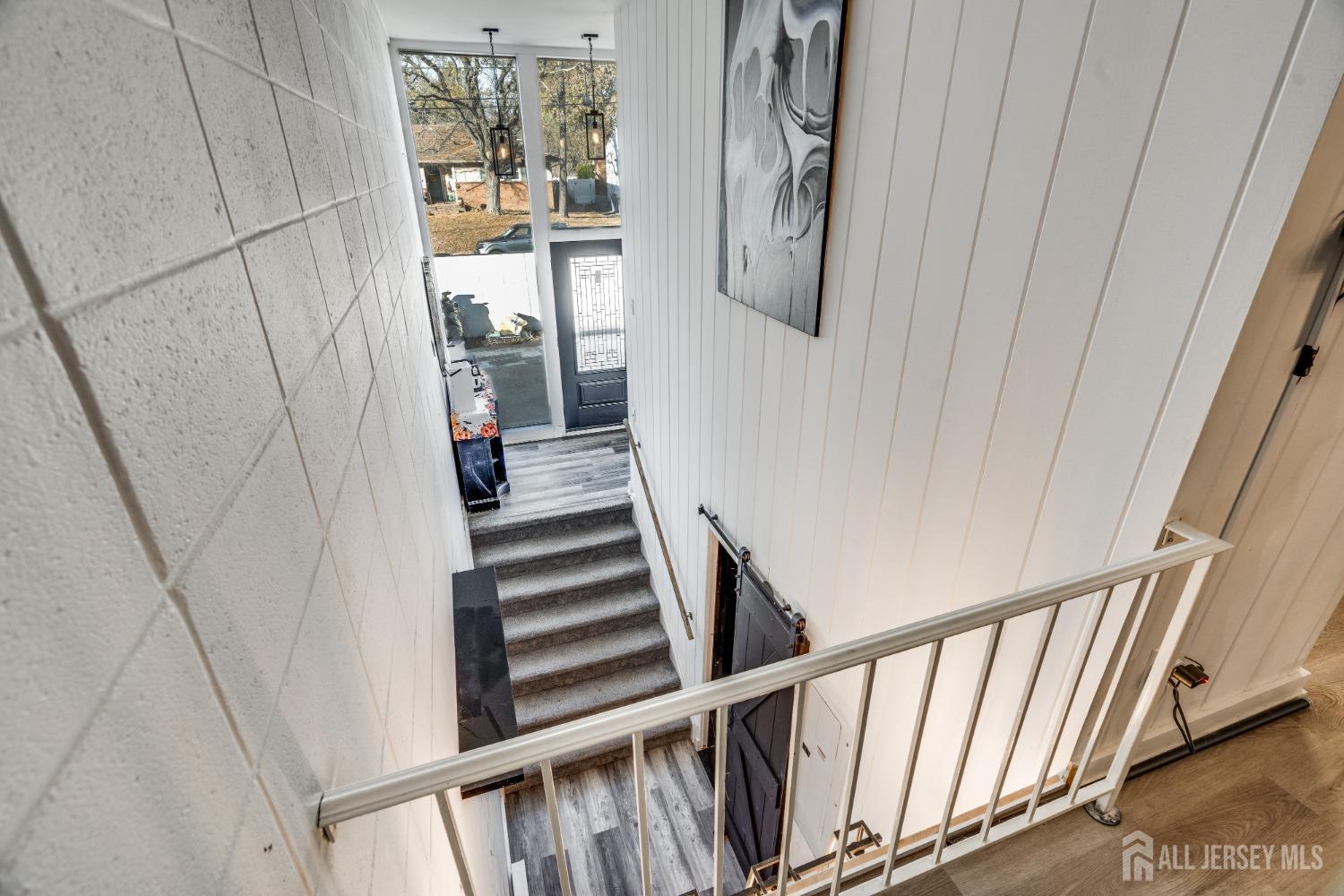 123 Risoli Terrace South Plainfield, NJ 07080 - Photo 28 of 46 a view of a stairs and an entryway