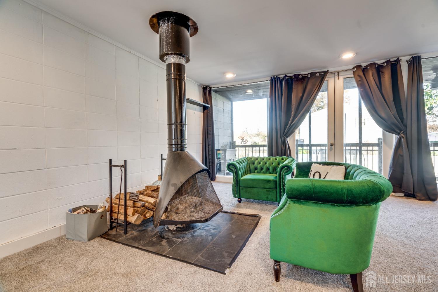 123 Risoli Terrace South Plainfield, NJ 07080 - Photo 37 of 46 a living room with furniture and a large window