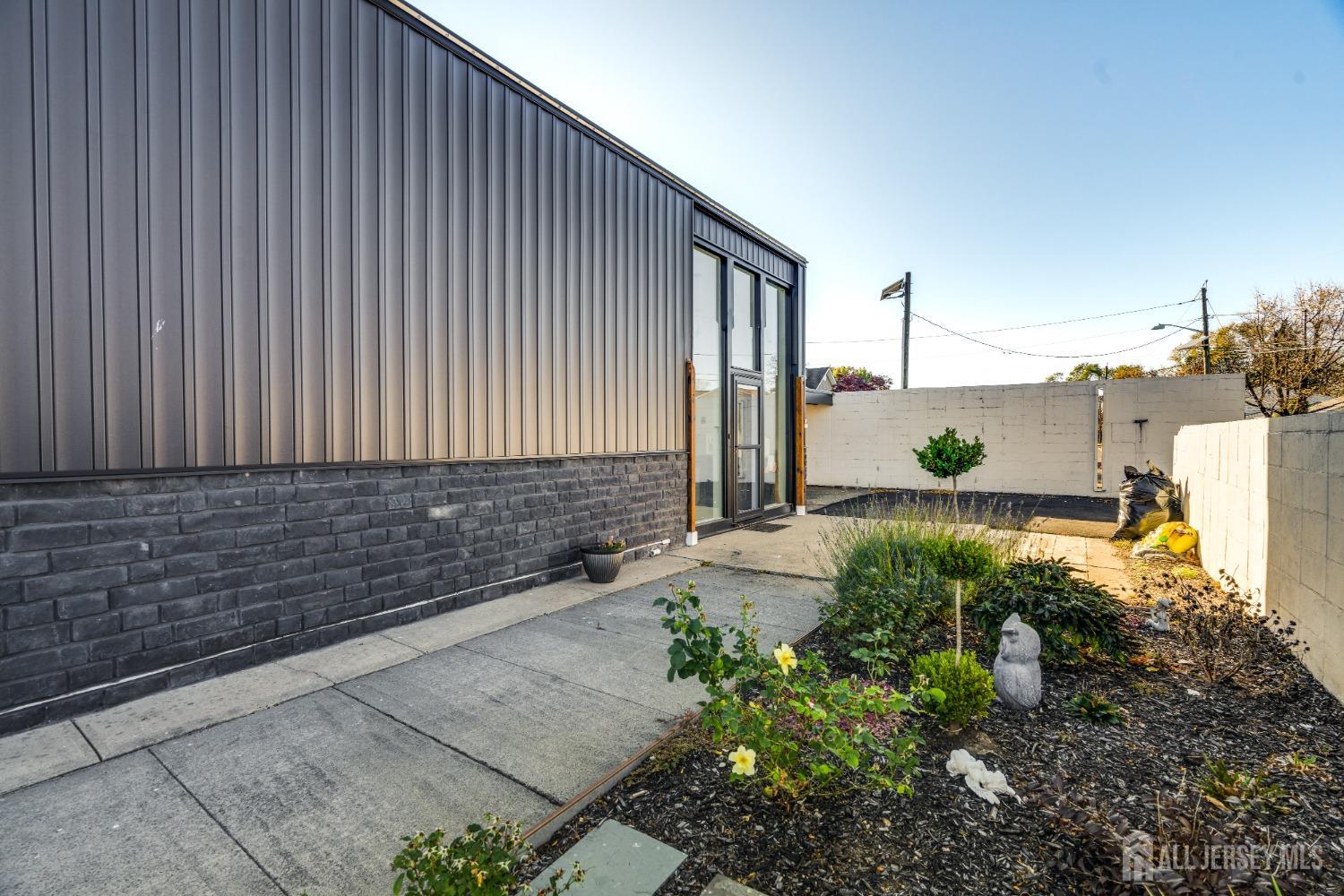 123 Risoli Terrace South Plainfield, NJ 07080 - Photo 4 of 46 a view of a pathway of a house