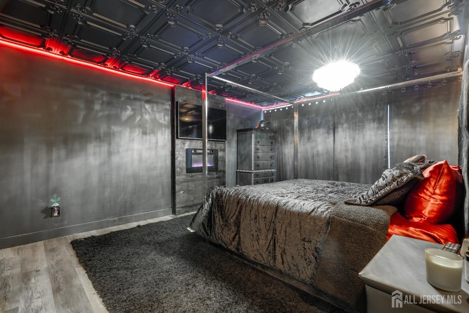 123 Risoli Terrace South Plainfield, NJ 07080 - Photo 41 of 46 a bed sitting in a room next to a window