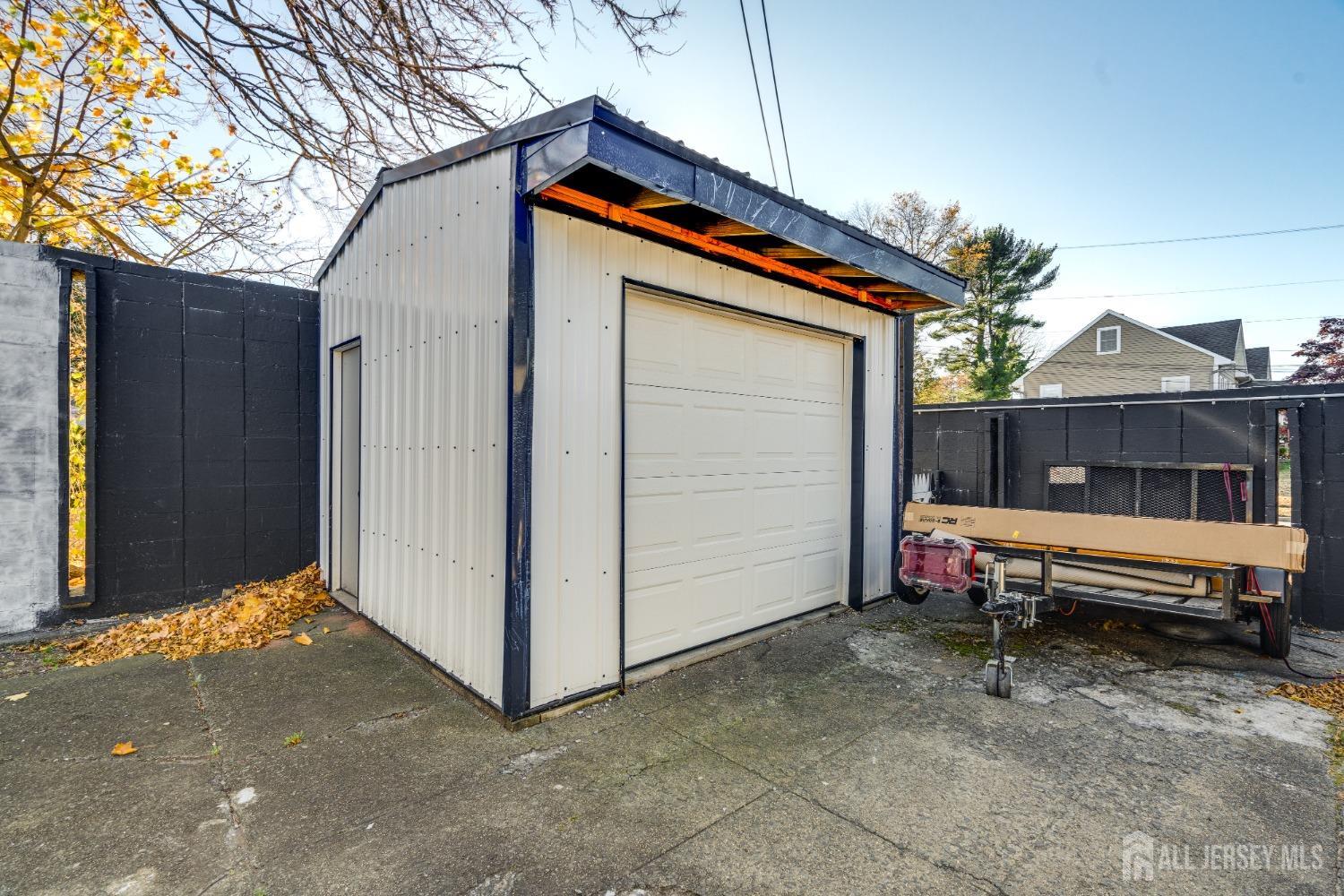 123 Risoli Terrace South Plainfield, NJ 07080 - Photo 7 of 46 a house view with a outdoor space
