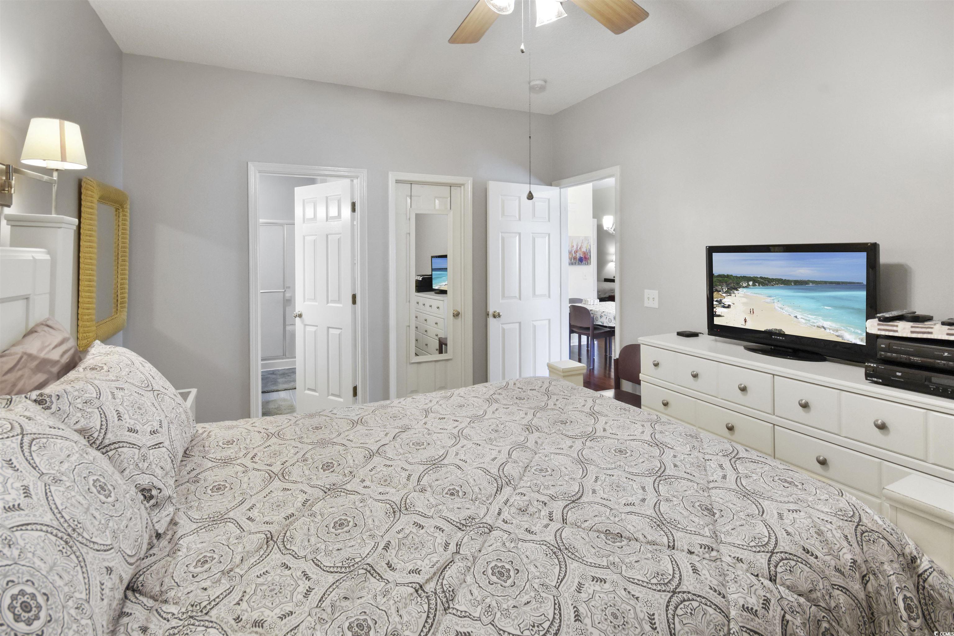 4502 Sweetwater Boulevard, Unit 4502 Murrells Inlet, SC 29576 - Photo 17 of 28 Bedroom featuring ceiling fan