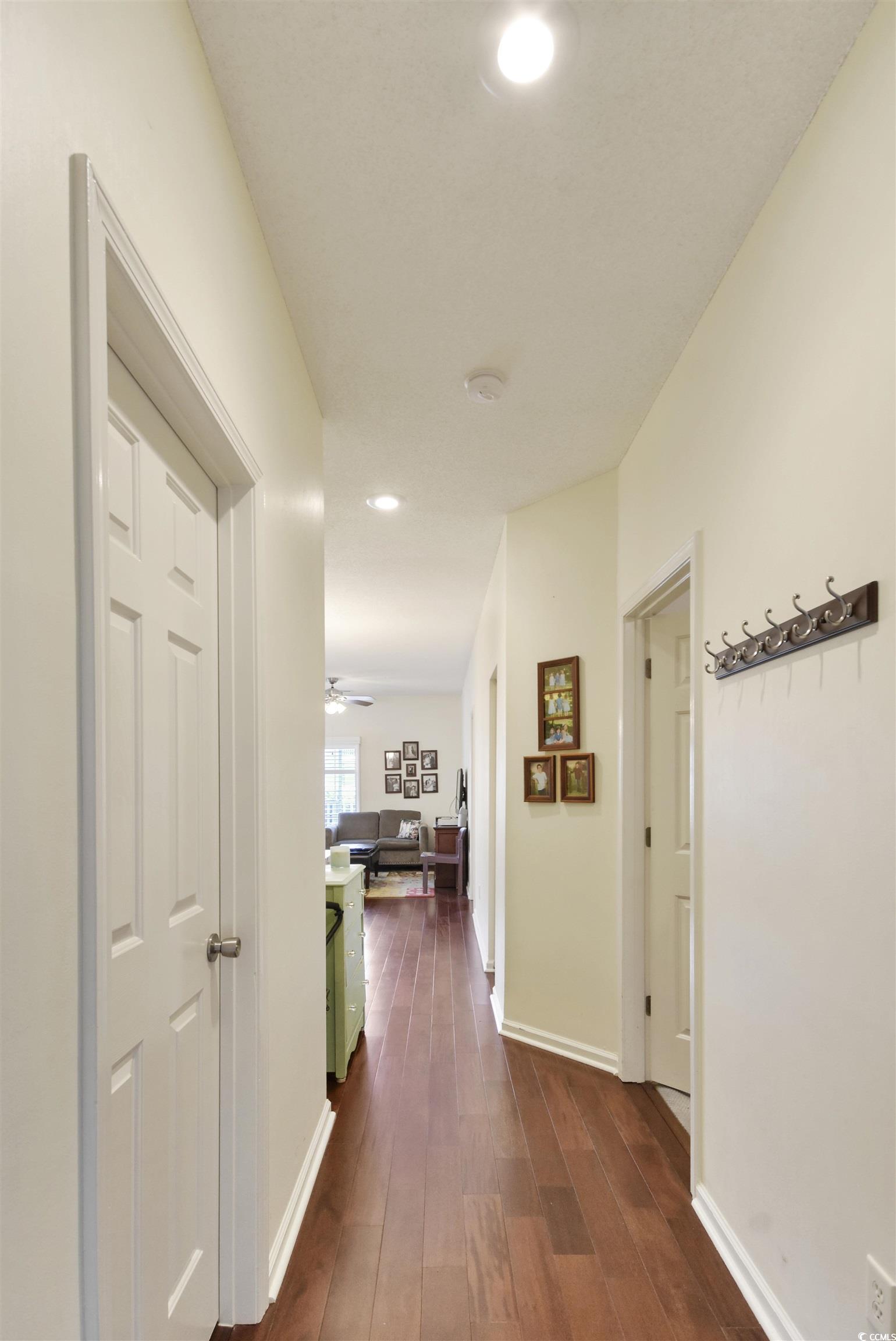 4502 Sweetwater Boulevard, Unit 4502 Murrells Inlet, SC 29576 - Photo 22 of 28 Corridor with dark wood finished floors and recessed lighting