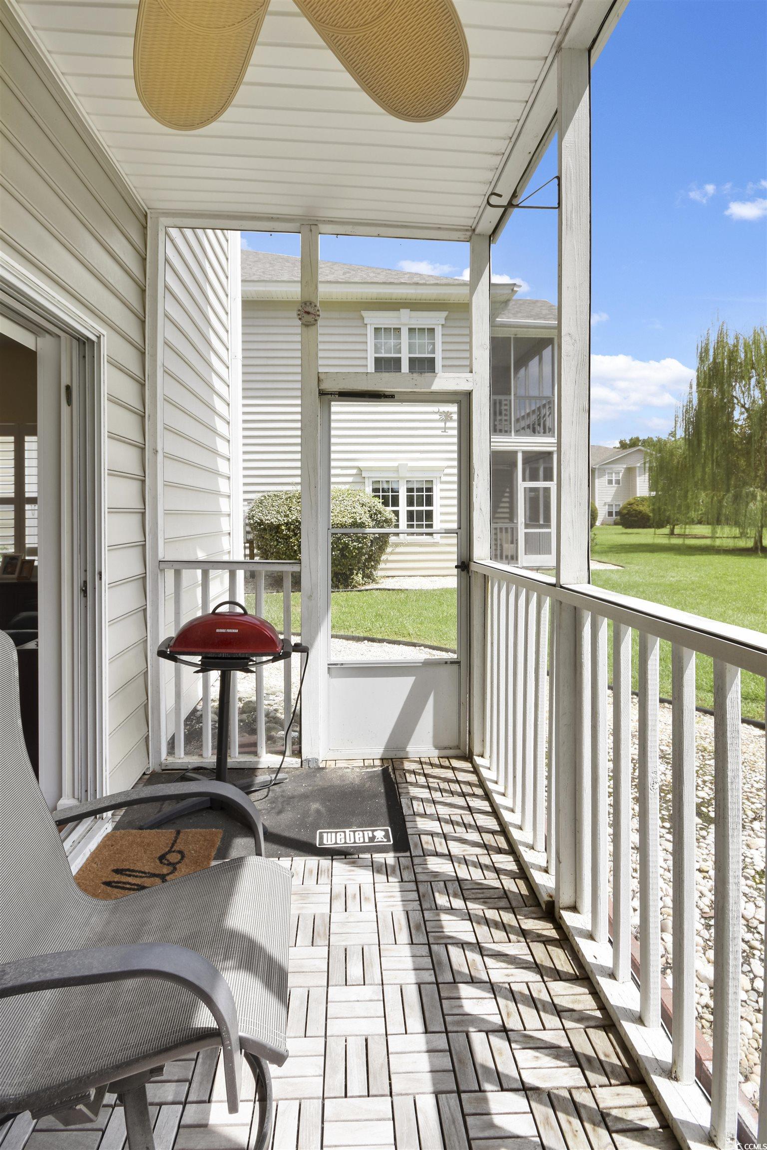 4502 Sweetwater Boulevard, Unit 4502 Murrells Inlet, SC 29576 - Photo 26 of 28 View of sunroom