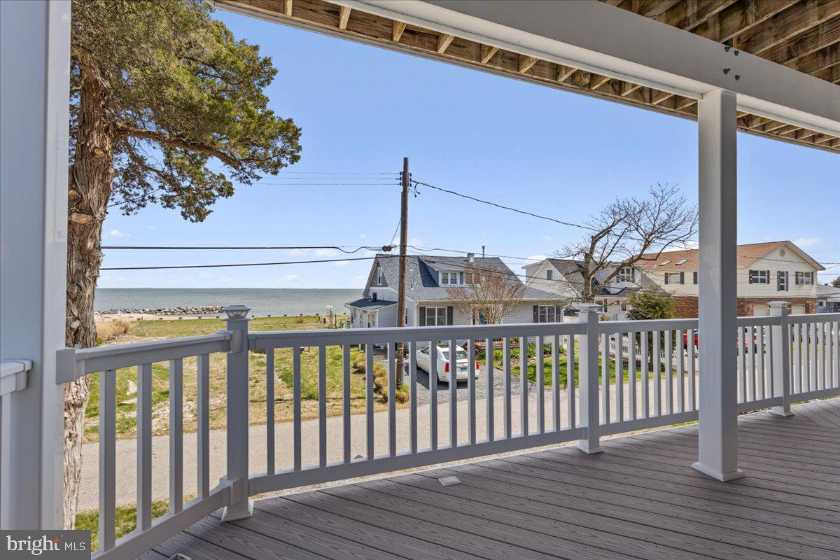 2818 Beach Drive Huntingtown, MD 20639 - Photo 28 of 74 a view of a balcony with wooden floor