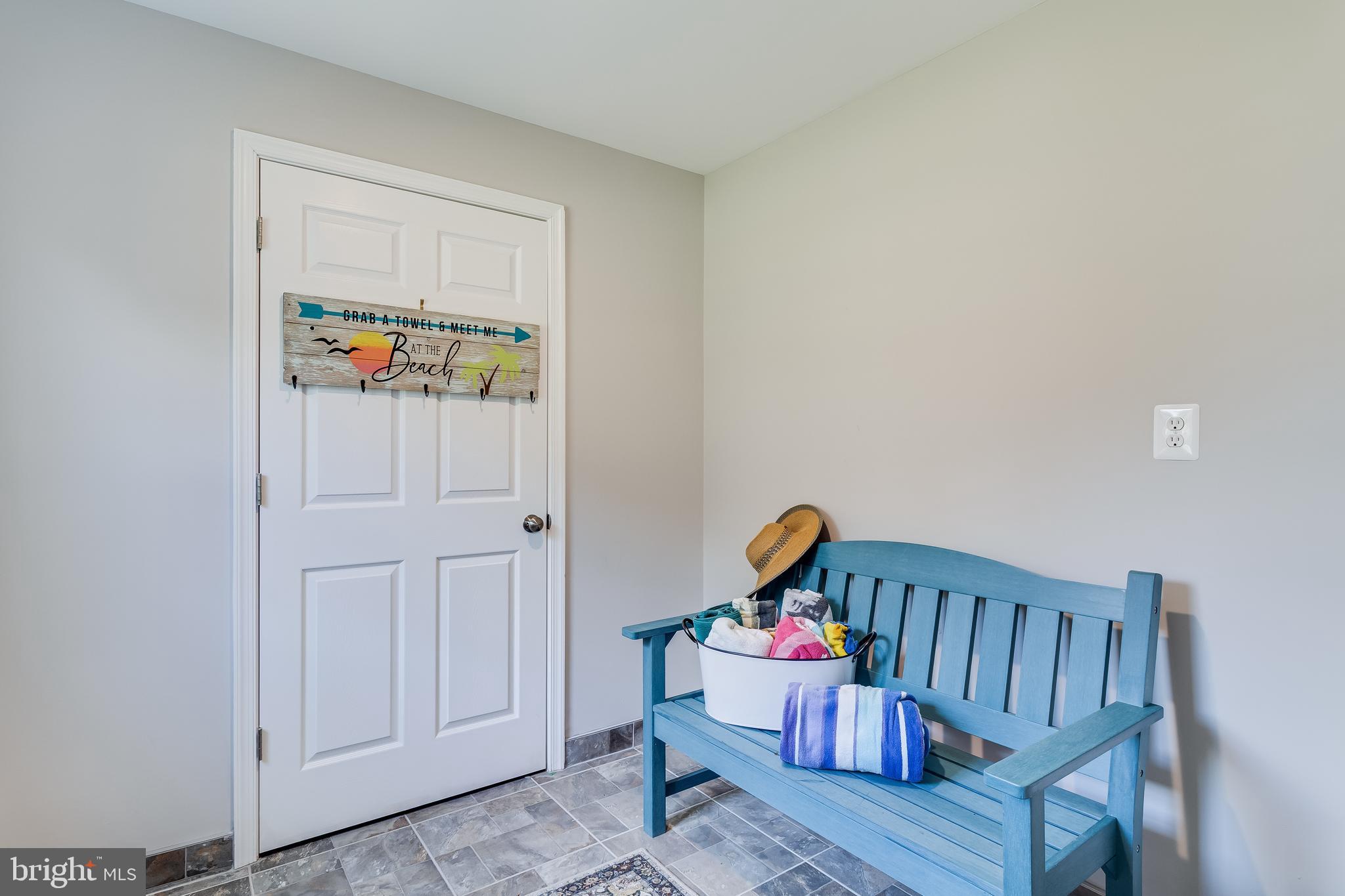 2818 Beach Drive Huntingtown, MD 20639 - Photo 46 of 74 a bedroom with furniture and baby crib