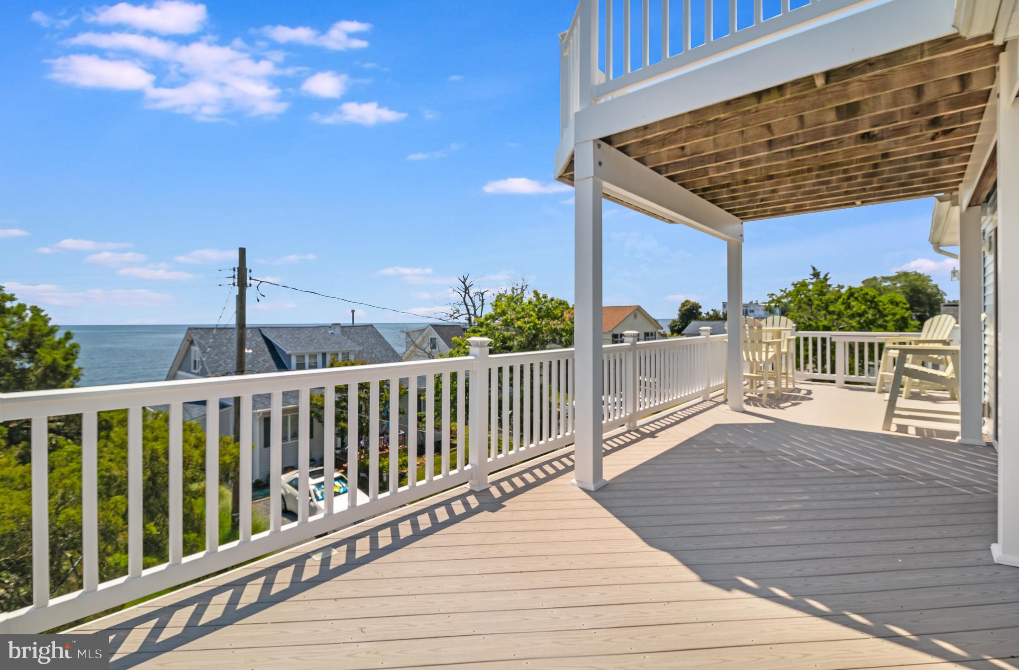 2818 Beach Drive Huntingtown, MD 20639 - Photo 51 of 74 a view of balcony with wooden floor and fence