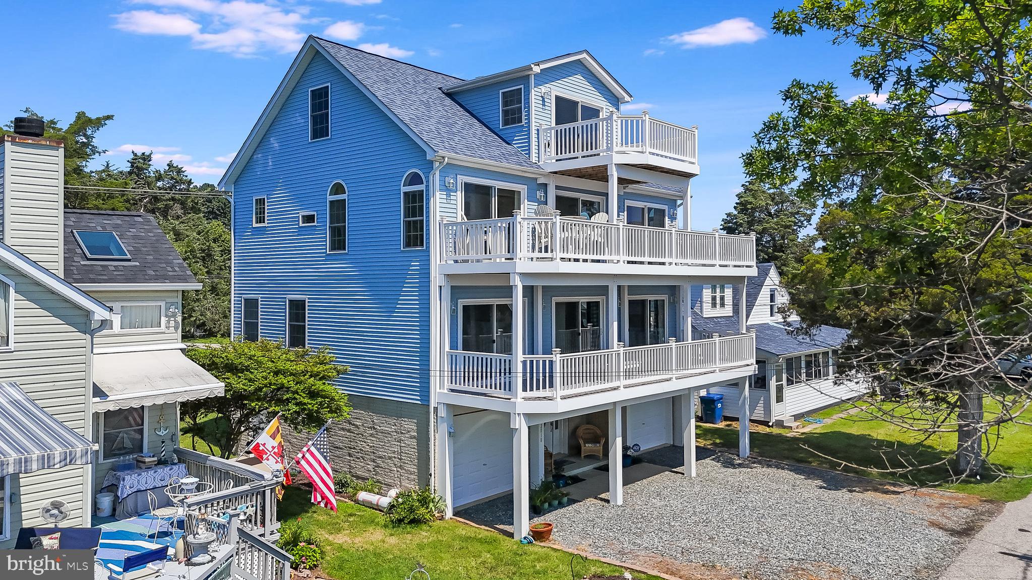 2818 Beach Drive Huntingtown, MD 20639 - Photo 59 of 74 a front view of a house with garden