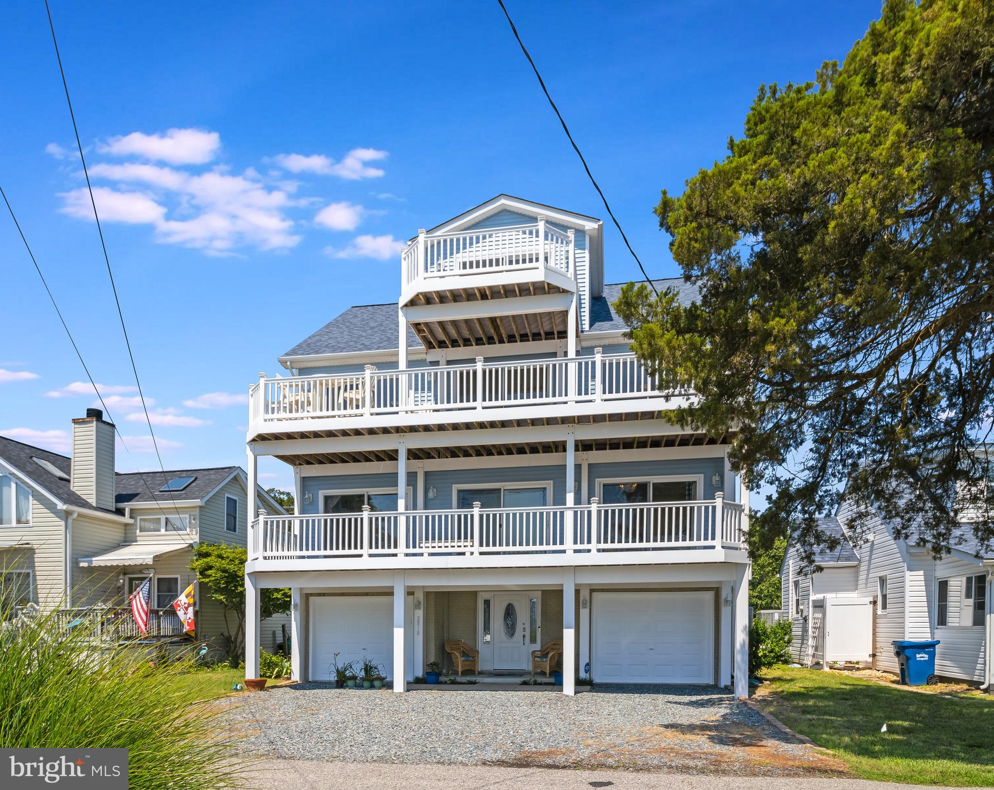 2818 Beach Drive Huntingtown, MD 20639 - Photo 65 of 74 a front view of a building with a garden