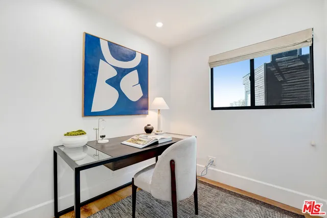 a bathroom with a double vanity sink mirror and double