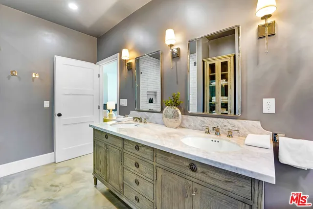 a bed room with a bed and a painting