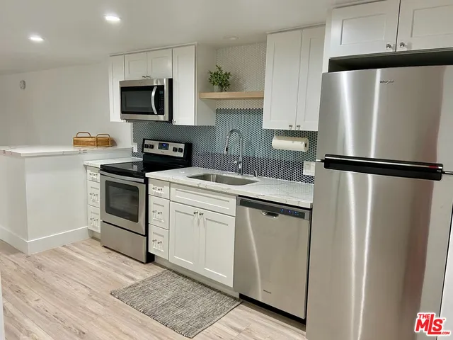 a cabinet with an empty shelf