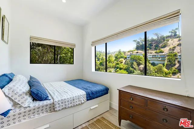 a view of a balcony with chairs