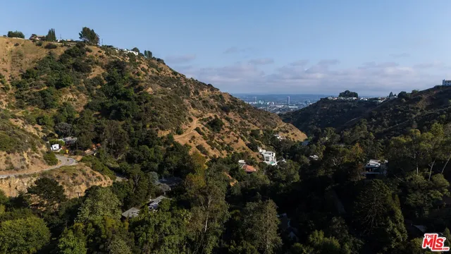 front view of a house with a small yard