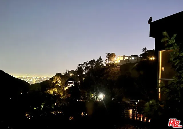 a front view of a house with garage