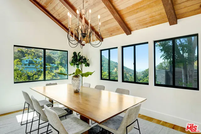 a kitchen with stainless steel appliances granite countertop a stove and a sink