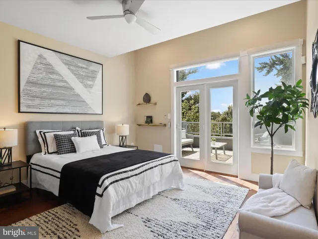 a view of front door with wooden floor