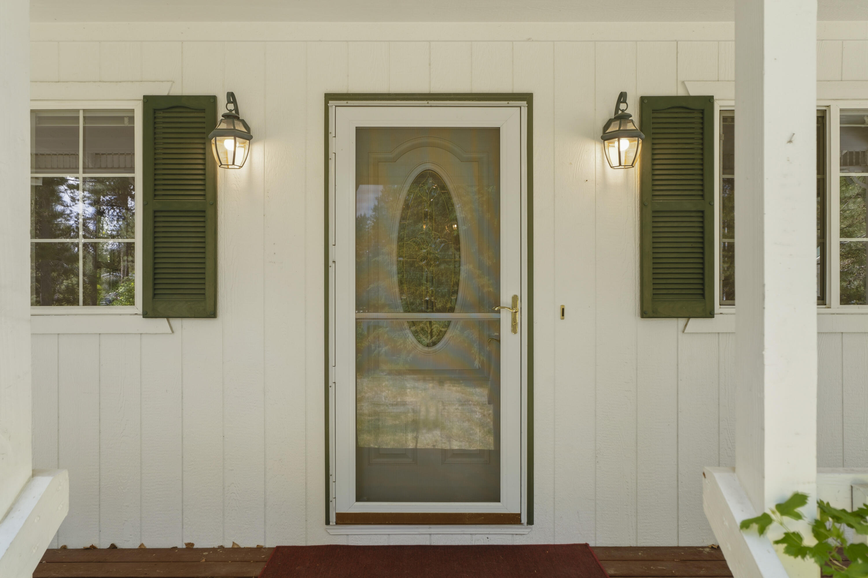 55885 Osprey Road Bend, OR 97707 - Photo 25 of 58 Front door with retractable screen.