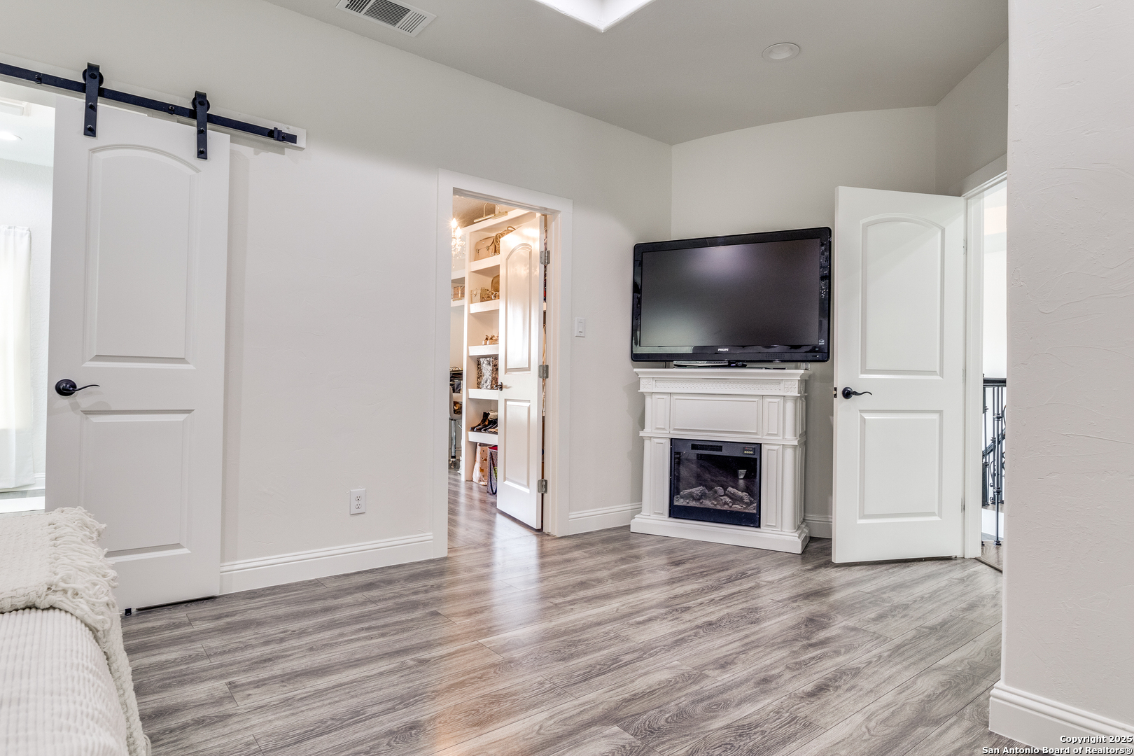1071 Hidden Valley Drive Spring Branch, TX 78070 - Photo 16 of 30 a living room with furniture and a flat screen tv