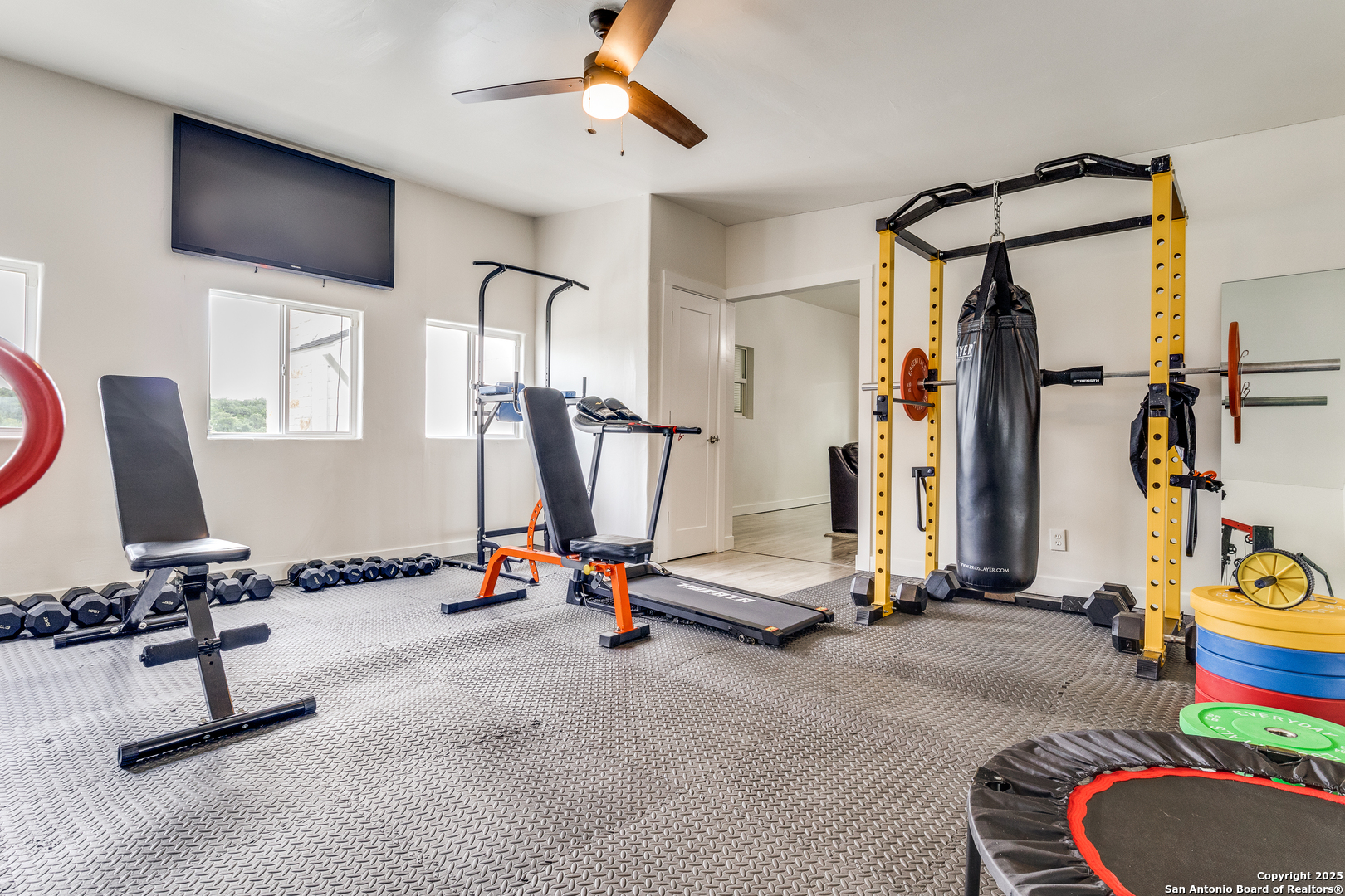 1071 Hidden Valley Drive Spring Branch, TX 78070 - Photo 20 of 30 a view of a room with gym equipment